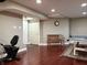 Finished basement with hardwood floors, recessed lighting, bench, and ping pong table at 12441 Bent Oak Ln, Indianapolis, IN 46236