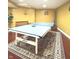 Basement featuring a recreational game, the ping pong table, on a stylish rug on hard wood floors at 12441 Bent Oak Ln, Indianapolis, IN 46236