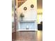 A bright and open entryway with hardwood floors and a decorative console table at 12441 Bent Oak Ln, Indianapolis, IN 46236