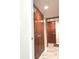 Hallway with tiled floor, a closet and a view of another room at 12441 Bent Oak Ln, Indianapolis, IN 46236