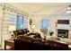 Cozy living room with fireplace and lots of natural light at 12441 Bent Oak Ln, Indianapolis, IN 46236