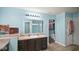 Bathroom vanity area with access to toilet room and walk-in closet at 1436 Amberwoods Ct, Indianapolis, IN 46239
