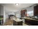 Open kitchen featuring stainless steel appliances and a central island with seating at 1436 Amberwoods Ct, Indianapolis, IN 46239