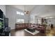 Spacious living room with high ceilings and a large leather sectional sofa at 1436 Amberwoods Ct, Indianapolis, IN 46239