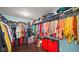 Walk in closet with built-in shelving and ample storage space at 1436 Amberwoods Ct, Indianapolis, IN 46239