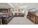 Open basement featuring a cozy seating area with large sectional sofa and entertainment area at 1442 Avondale Dr, Westfield, IN 46074