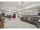 Spacious finished basement featuring a comfortable seating area and game room with several fun arcade games at 1442 Avondale Dr, Westfield, IN 46074