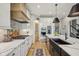 Modern kitchen features a black farmhouse sink, stainless steel appliances, and stylish cabinets at 1442 Avondale Dr, Westfield, IN 46074