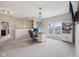 Upstairs office space featuring a desk, custom bookshelves, a view of the neighborhood, and overhead lighting at 1442 Avondale Dr, Westfield, IN 46074
