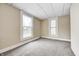 Bright bedroom with natural light and neutral walls and carpet at 156 S Cross St, Clayton, IN 46118