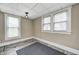 Dining room featuring tile flooring, natural lighting, and neutral colored walls at 156 S Cross St, Clayton, IN 46118