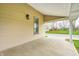 Exterior view from a covered porch, including a window and view of the street at 156 S Cross St, Clayton, IN 46118