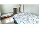 Cozy bedroom with a gray bookcase and colorful books at 15958 Oakhurst Ln, Fishers, IN 46040