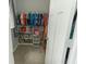 Closet featuring shelving, hanging rods, and a window that provides natural lighting to the space at 15958 Oakhurst Ln, Fishers, IN 46040