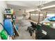 Spacious garage with ample storage space, including shelves, tools, and overhead storage at 15958 Oakhurst Ln, Fishers, IN 46040
