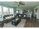 Bright open-concept living room flowing into the kitchen and dining area at 15958 Oakhurst Ln, Fishers, IN 46040