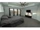 Main bedroom offers views of the pond from large windows and a walk in closet at 15958 Oakhurst Ln, Fishers, IN 46040