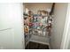 Walk-in pantry with wire shelving to maximize storage, conveniently located off the kitchen at 15958 Oakhurst Ln, Fishers, IN 46040