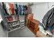 Organized walk-in closet with ample shelving, hanging rods, and natural lighting, offering great storage at 15958 Oakhurst Ln, Fishers, IN 46040