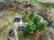 Aerial view of the property featuring a creek and wooded surroundings at 2025 State Road 47, Lebanon, IN 46052