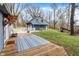 Backyard with deck and view of cottage at 2025 State Road 47, Lebanon, IN 46052