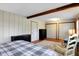 Spacious bedroom boasting wood floors, closet space, and a vintage-style blue desk for added charm at 2025 State Road 47, Lebanon, IN 46052