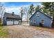 Home and garage with connected driveway and white picket fence at 2025 State Road 47, Lebanon, IN 46052