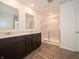 This bathroom offers a shower, vanity, and hard surface flooring at 211 Ames Dr, Whiteland, IN 46184