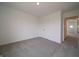 Neutral carpeted bedroom includes closet with double doors for great storage space at 211 Ames Dr, Whiteland, IN 46184