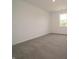 Serene bedroom with neutral carpet, a large window, and ample natural light at 211 Ames Dr, Whiteland, IN 46184