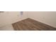 The laundry room offers wood-look flooring and washer dryer hookups at 211 Ames Dr, Whiteland, IN 46184