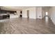 Spacious living area leading to the kitchen with a large island at 211 Ames Dr, Whiteland, IN 46184