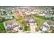 Aerial view showcasing the property within a Gathering-friendly neighborhood with mature trees at 2209 Foxfire Ct, Greenfield, IN 46140