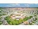 An aerial view of the neighborhood featuring a pond and surrounding residential homes and grassy yards at 2209 Foxfire Ct, Greenfield, IN 46140