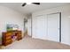 Bedroom with ceiling fan, closet, and space for desk and television at 2209 Foxfire Ct, Greenfield, IN 46140
