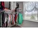 Walk-in closet with ample storage space featuring built in shelves and window at 2209 Foxfire Ct, Greenfield, IN 46140