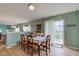 Cozy dining area with a sliding door to patio, perfect for indoor/outdoor dining and entertaining guests at 2209 Foxfire Ct, Greenfield, IN 46140