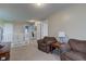 Upstairs hallway featuring carpeted floors, neutral paint, and textured ceiling at 2209 Foxfire Ct, Greenfield, IN 46140