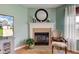Cozy living room featuring a fireplace, tv, and comfortable seating at 2209 Foxfire Ct, Greenfield, IN 46140