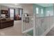 Inviting living room space featuring plush seating, natural light, and comfortable carpeting at 2209 Foxfire Ct, Greenfield, IN 46140