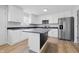 Updated kitchen features new stainless steel appliances, granite counters and ample cabinet space at 2405 Providence Ct, Greenwood, IN 46143