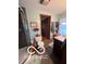 Bathroom with a toilet, a shower, brown tile, and white and blue accents at 3030 N 600 E, Lebanon, IN 46052