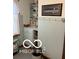 Bathroom features painted beadboard, open shelving, and a window with lace curtains at 3030 N 600 E, Lebanon, IN 46052