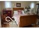 Cozy bedroom featuring a sleigh bed, hardwood floors, and natural light at 3030 N 600 E, Lebanon, IN 46052
