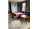 Bedroom with a small, dark metal bed frame, wooden chairs, and a table at 3030 N 600 E, Lebanon, IN 46052