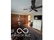Spacious bedroom with closet, hardwood flooring, ceiling fan, and an additional sitting area at 3030 N 600 E, Lebanon, IN 46052