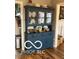 Elegant blue hutch showcasing dishware and decorative items at 3030 N 600 E, Lebanon, IN 46052