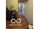 Inviting hallway with warm wood floors leads to other rooms at 3030 N 600 E, Lebanon, IN 46052