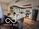Bright kitchen with stainless steel appliances, large island, and eat-in bar at 3030 N 600 E, Lebanon, IN 46052