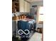 Bright laundry room with front load washer/dryer, storage, and natural light at 3030 N 600 E, Lebanon, IN 46052